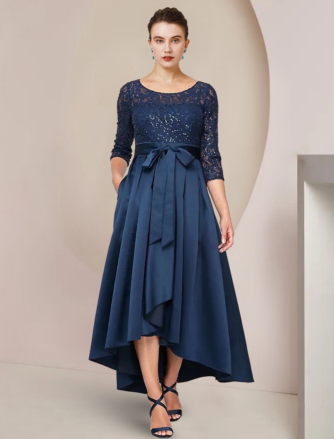 Elegant A-Line Mother of the Bride dress with high-low hem and 3/4 sleeves.