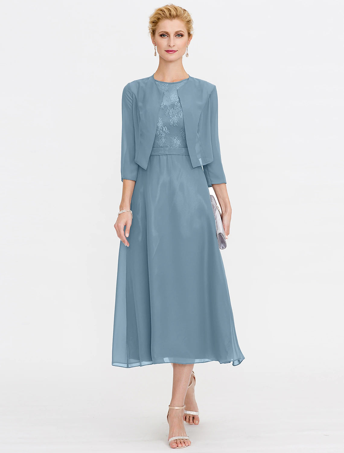 Back view of a woman wearing a plus size chiffon and lace A-line dress with a matching wrap.