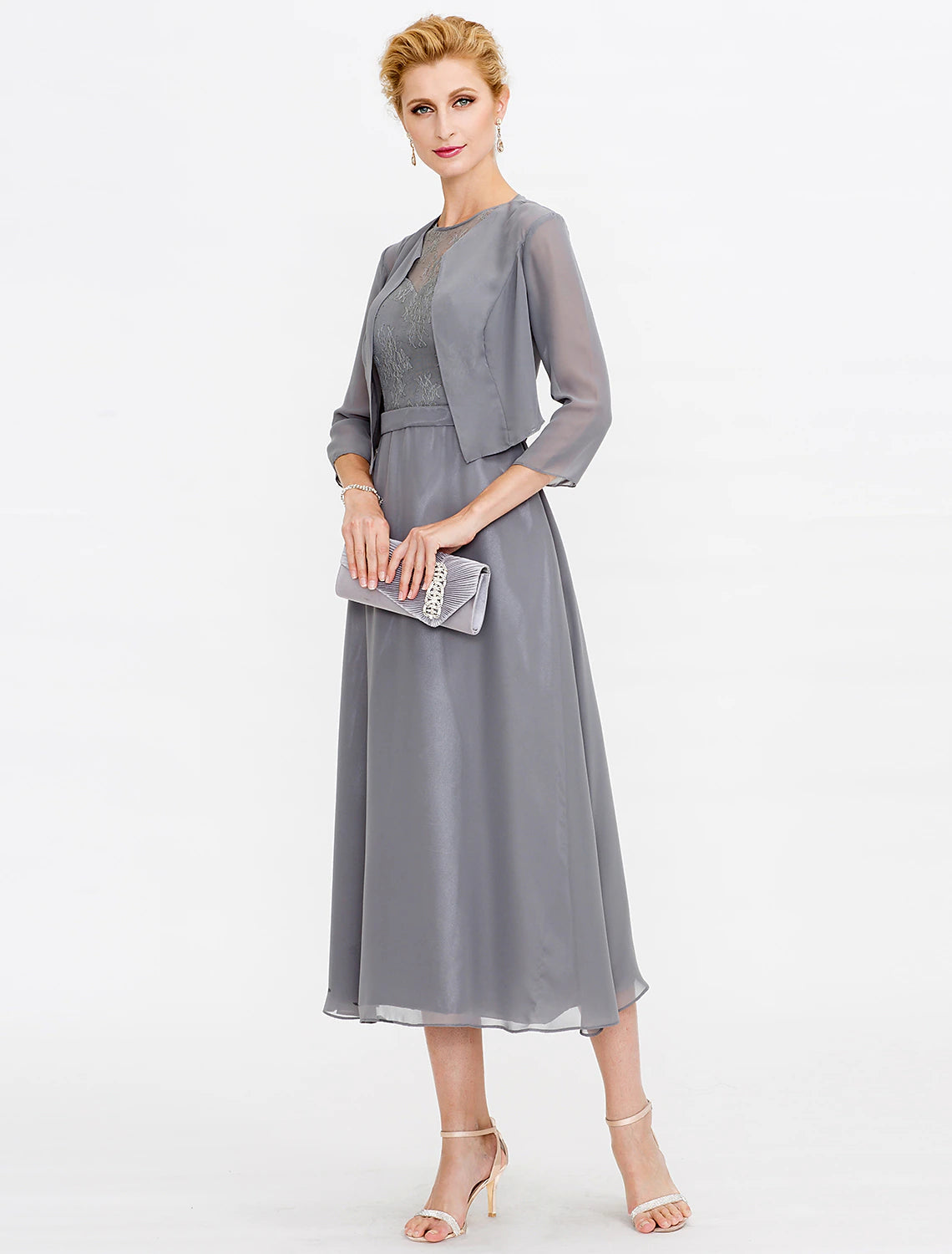 Close-up of the corded lace and chiffon fabric on the elegant A-line dress.