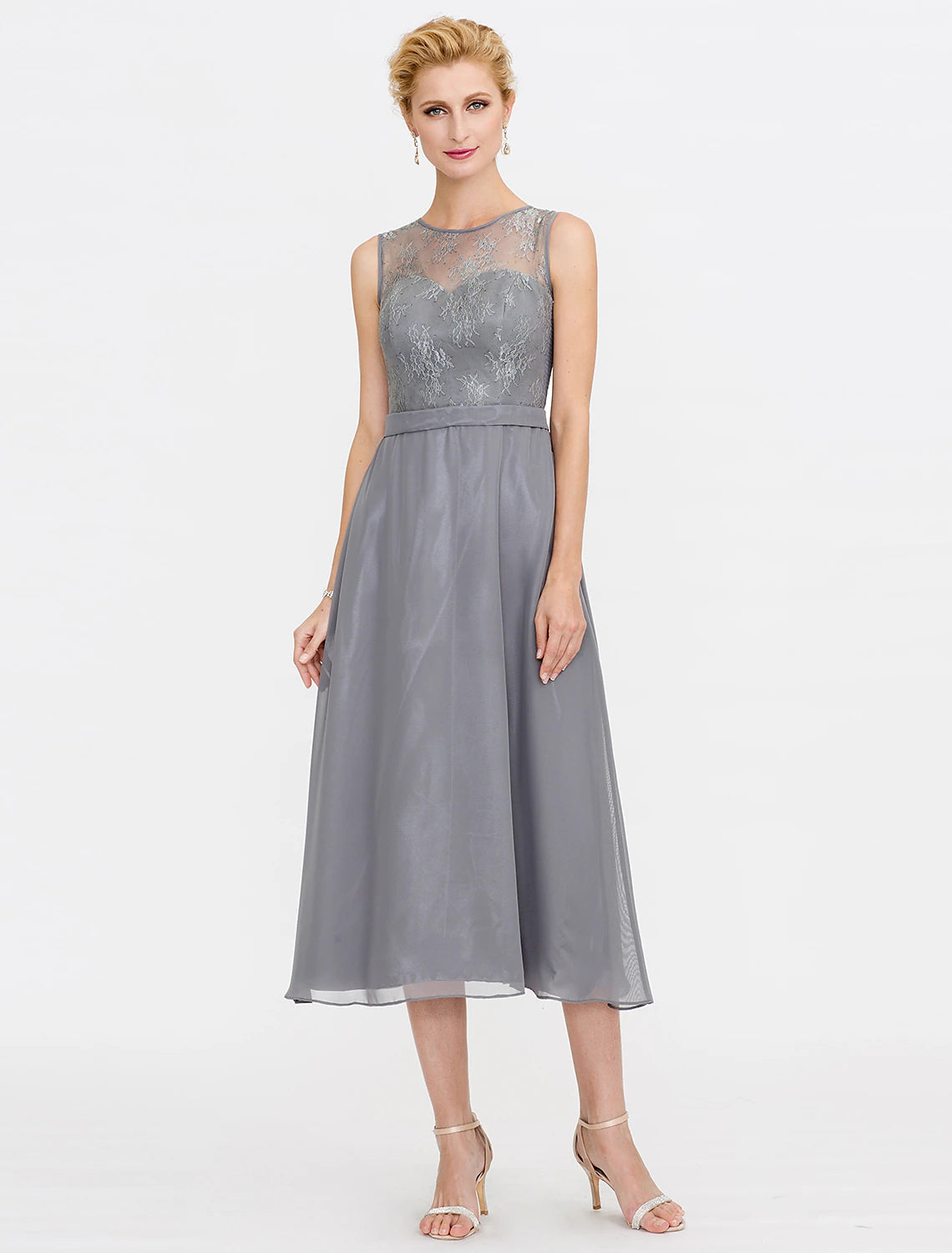 Detail of the included lace wrap, complementing the A-line mother of the bride dress.