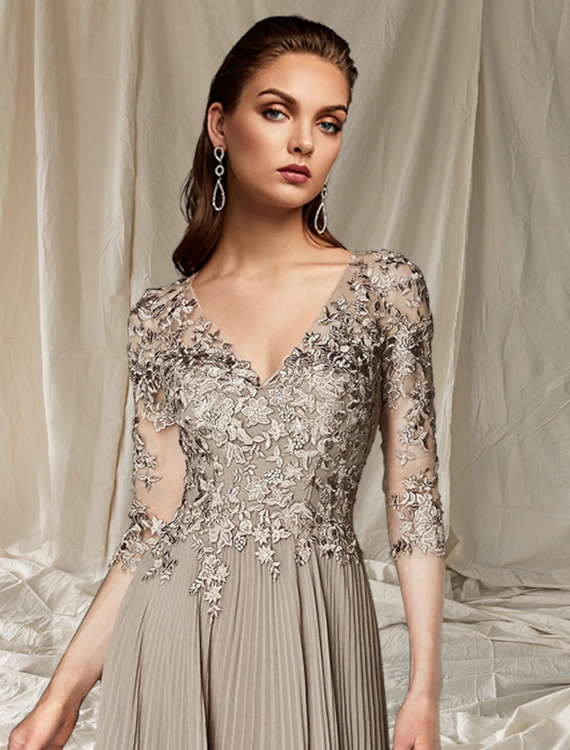 Model showcasing the plus size A-line formal dress.