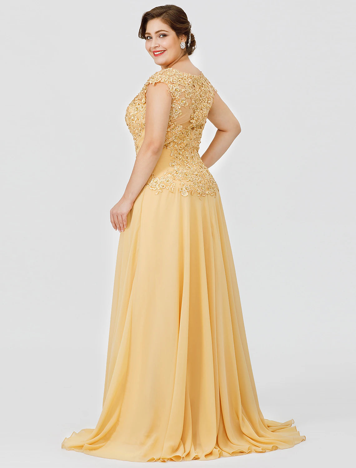Close-up of beaded lace and illusion neckline on a formal short sleeve gown.