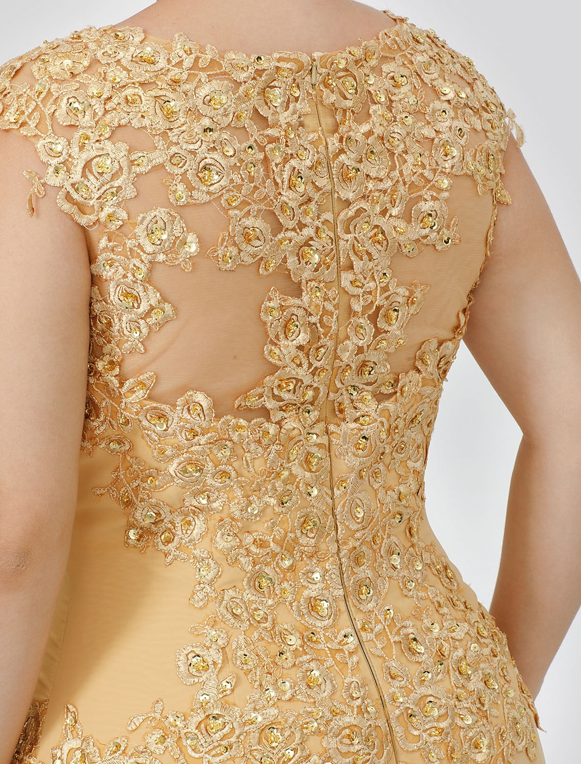 Detail of the short sleeve and bow accent on an elegant Mother of the Bride dress.
