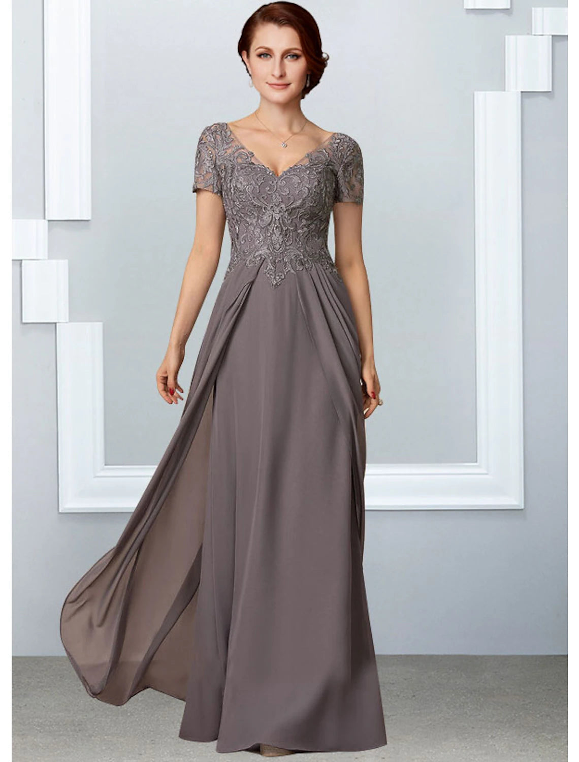 Elegant A-Line Mother of the Bride dress with V-neck and short sleeves.