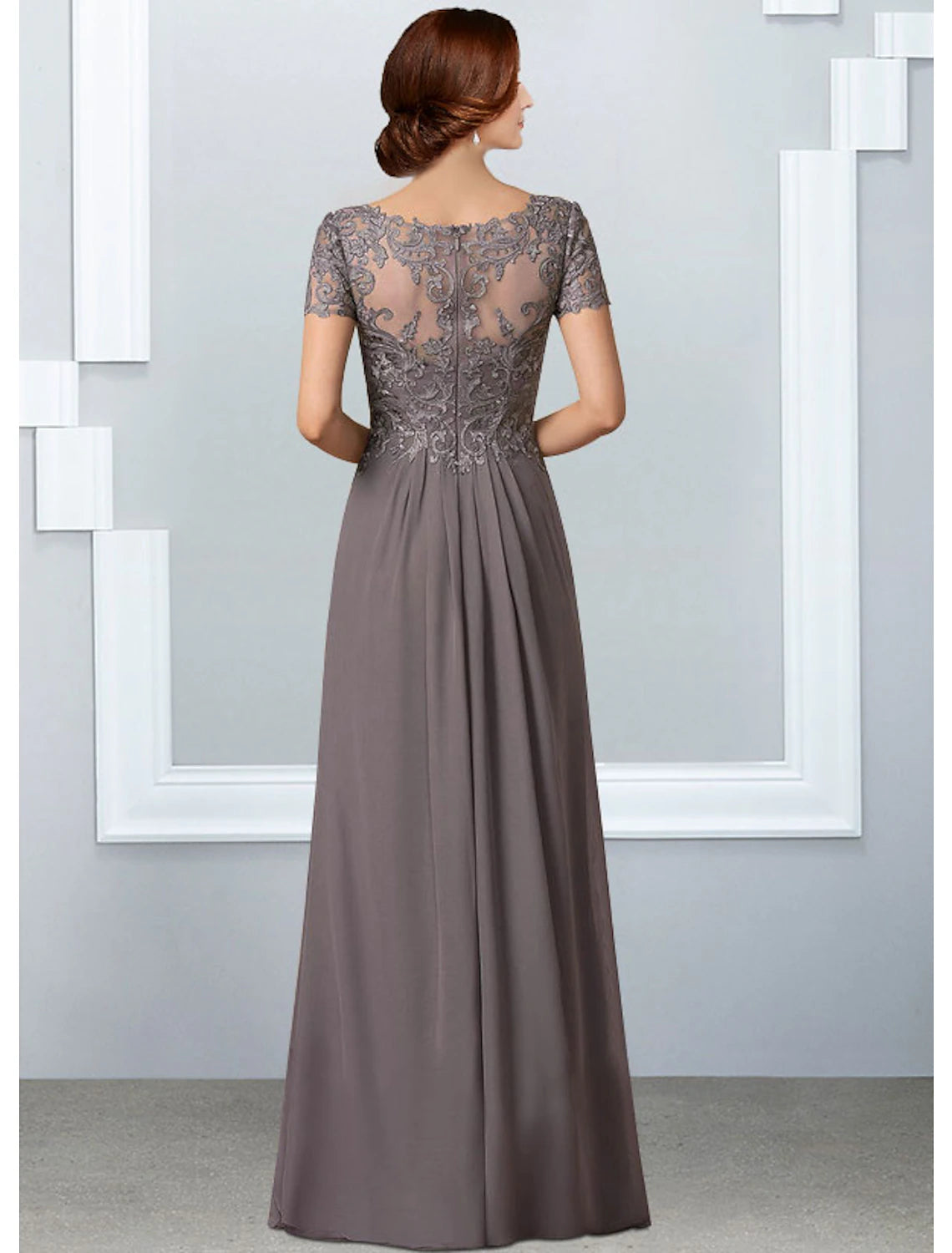 Back view of elegant floor-length Mother of the Bride dress.