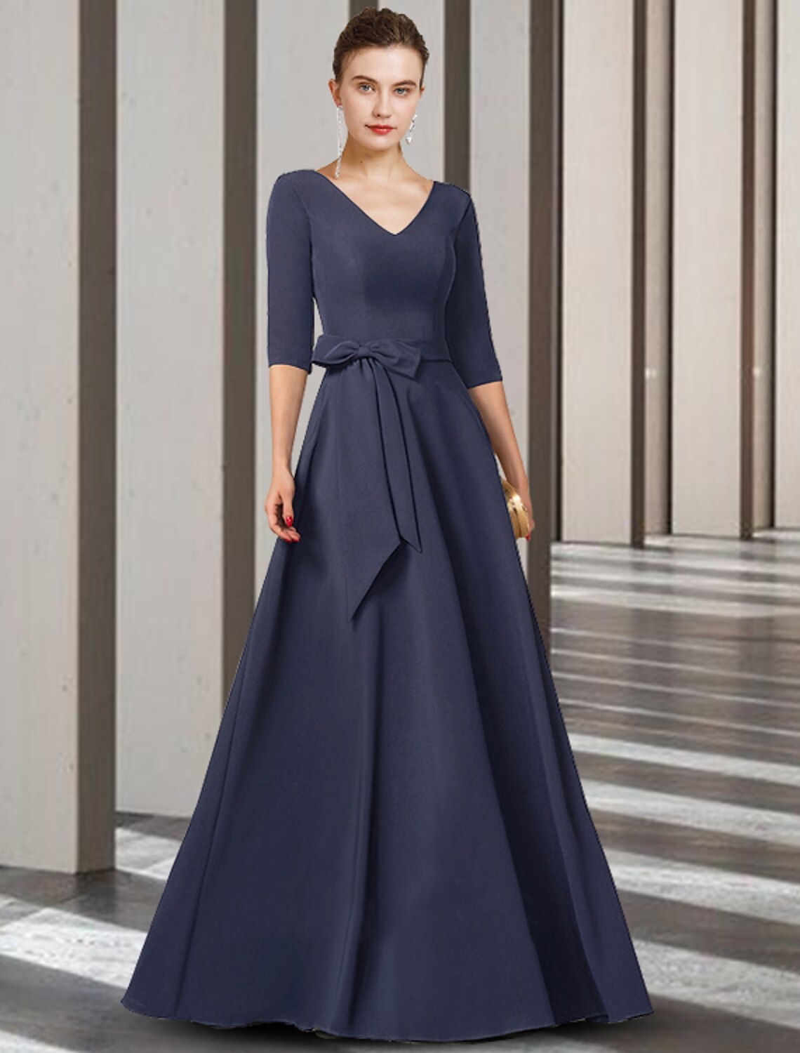 Elegant chiffon sheath column Mother of the Bride dress with V-neck and half sleeves.