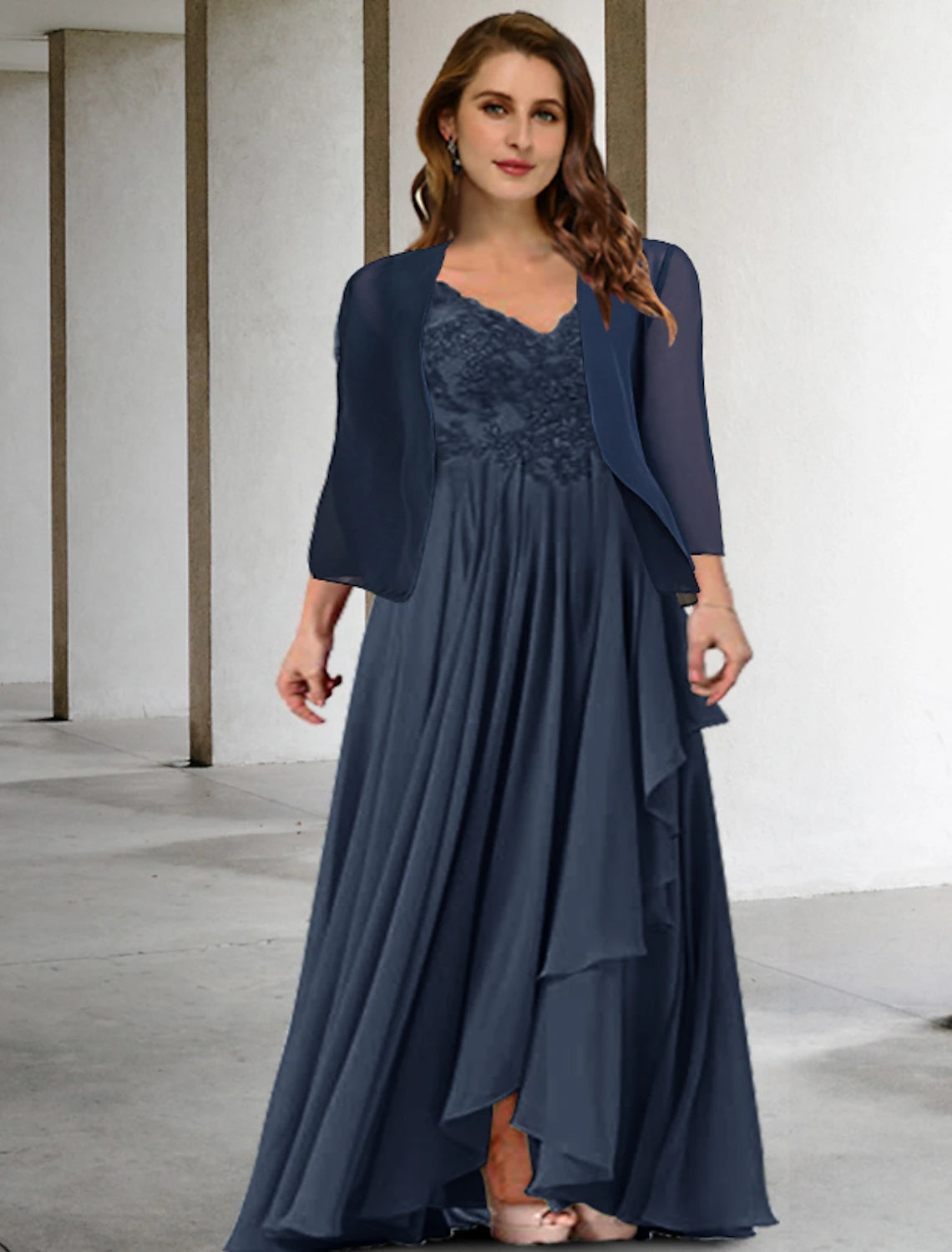 Elegant two-piece A-line mother of the bride dress in chiffon with half sleeves and V-neck.