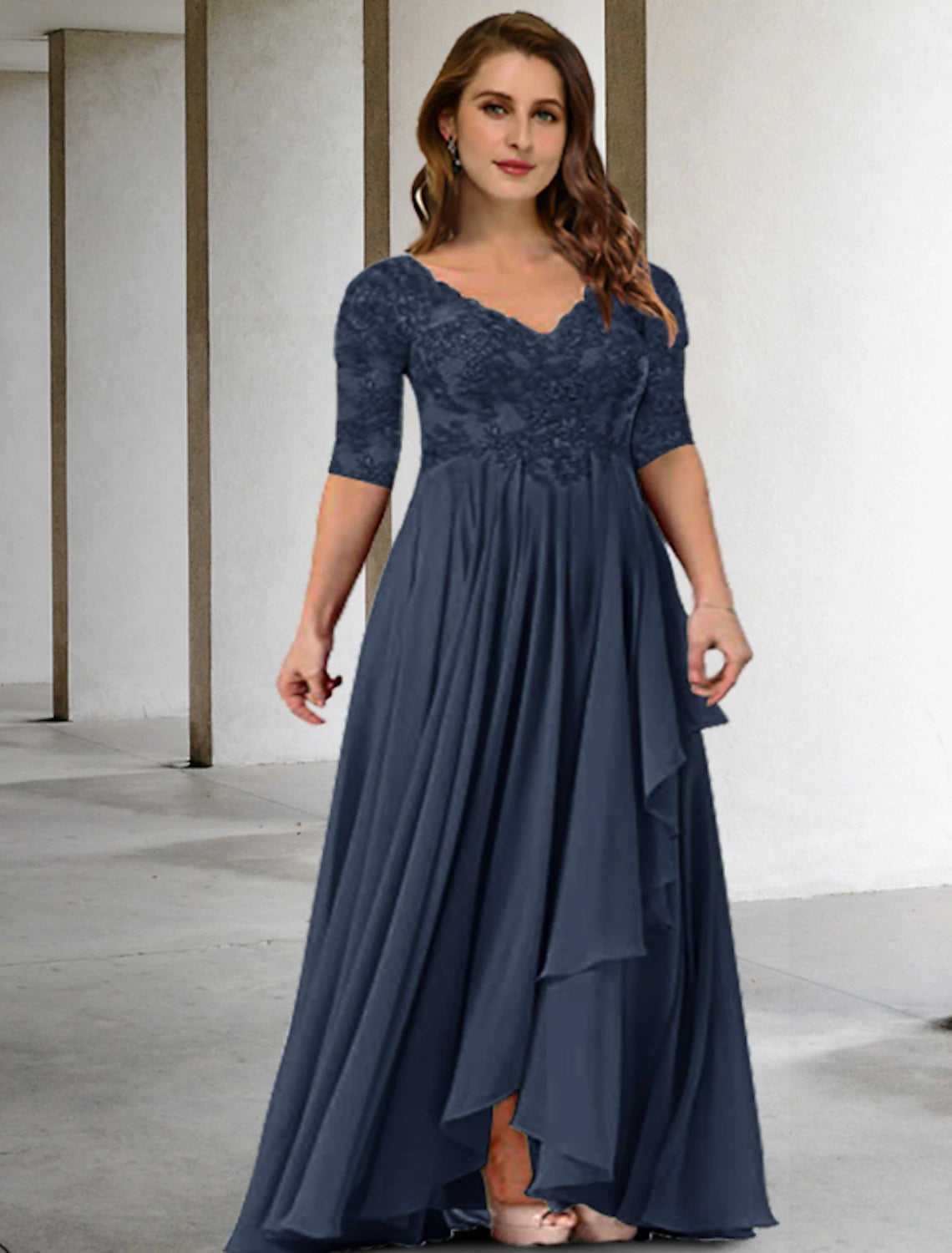 Side view of an elegant floor-length mother of the bride dress, showing the A-line silhouette.