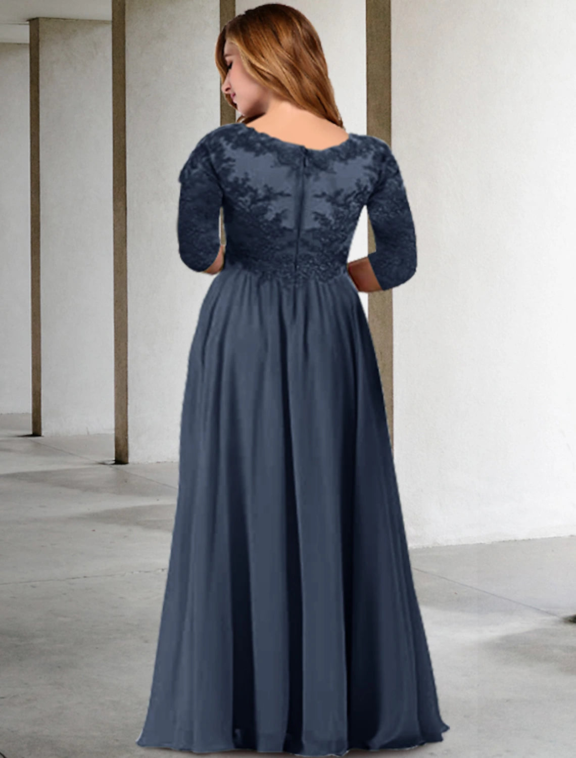 Close-up of the V-neckline and half sleeves on a formal chiffon dress.