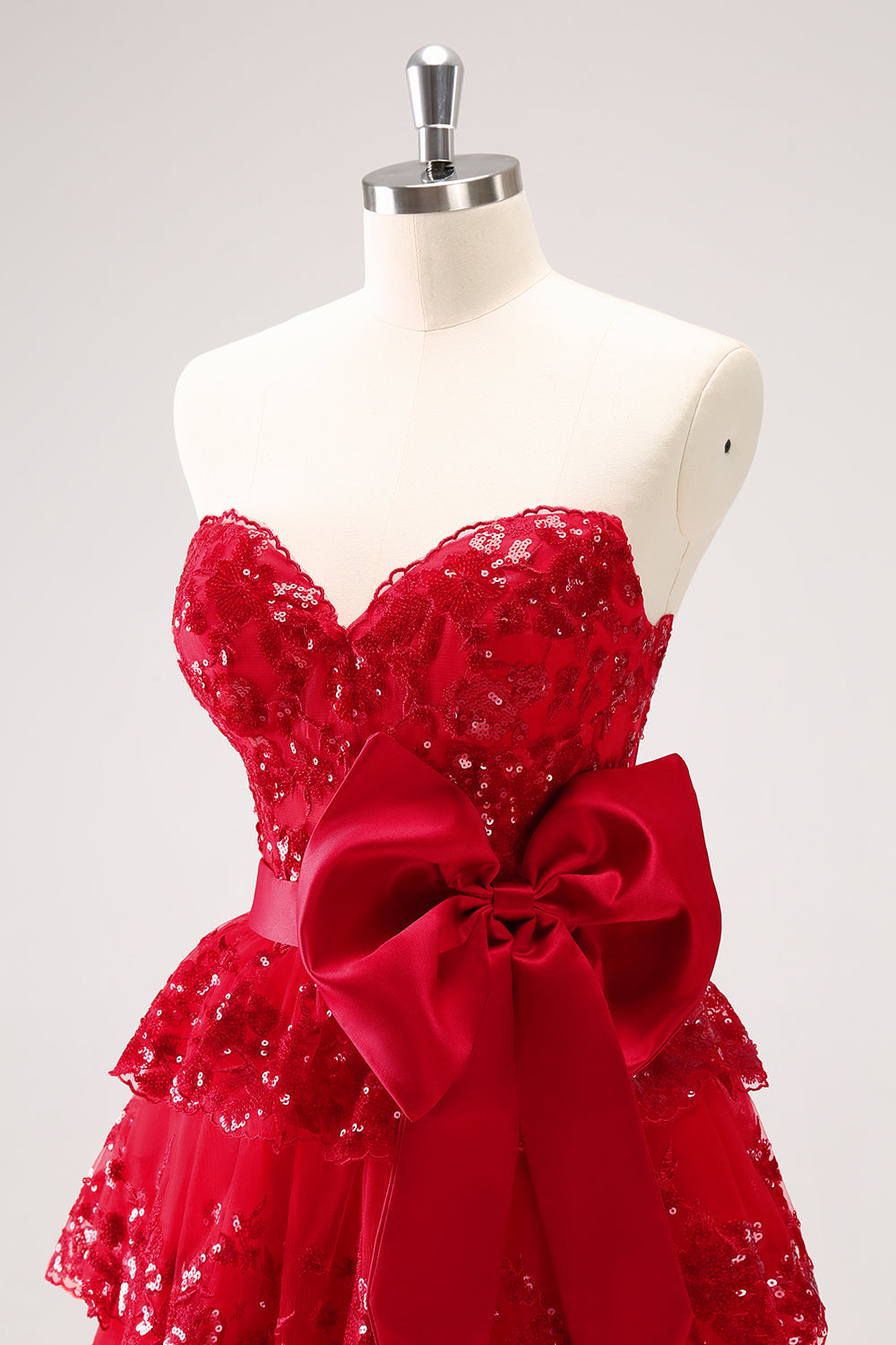 Luolandi Sparkly Red A Line Sweetheart Corset Tiered Ruffle Homecoming Dress with Bows Off Shoulder