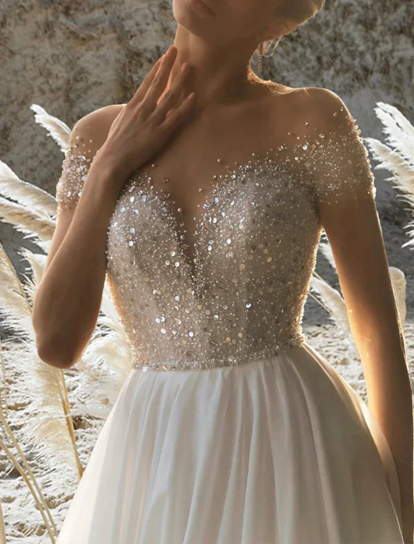 Luolandi Beach Formal Wedding Dresses A-Line Off Shoulder Short Sleeve Court Train Chiffon Bridal Gowns With Pleats Beading Sparkly