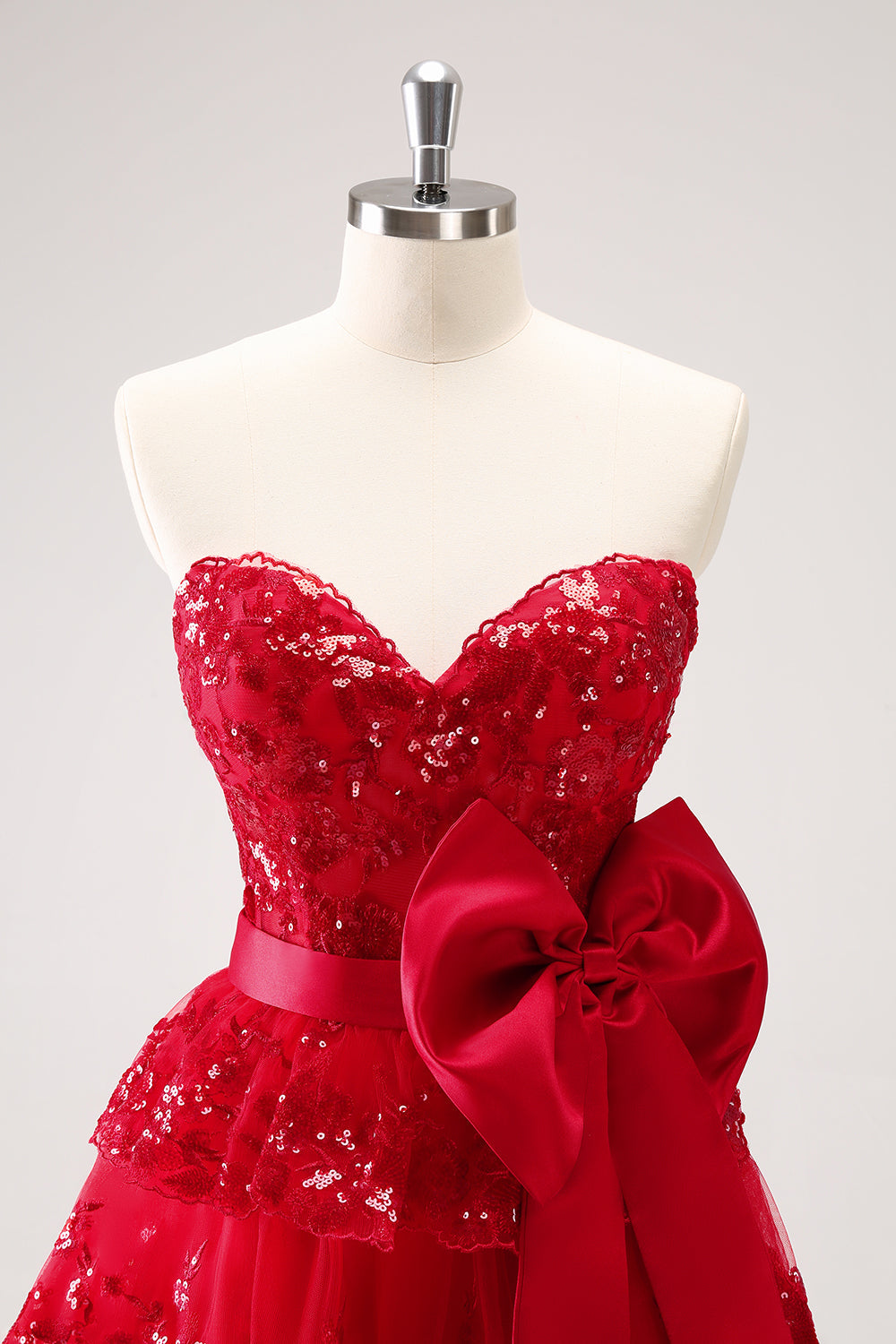 Luolandi Sparkly Red A Line Sweetheart Corset Tiered Ruffle Homecoming Dress with Bows Off Shoulder