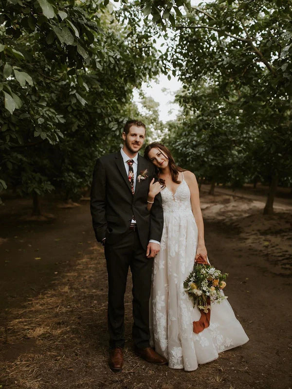 Luolandi Elegant Appliqued Spaghetti Straps V-Neck Backless A-line Wedding Dresses Beautiful