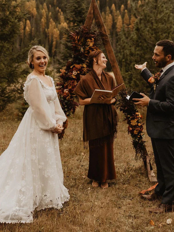 Luolandi Tulle Appliques Illusion Long Sleeves V-Neck Backless Wedding Dresses Elegant