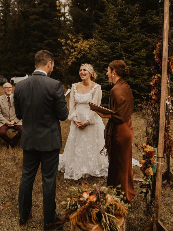 Luolandi Tulle Appliques Illusion Long Sleeves V-Neck Backless Wedding Dresses Elegant