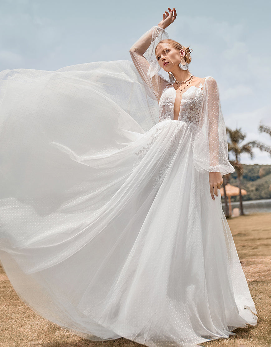 Luolandi Long Sleeves Open Back Ivory A Line Wedding Dress with Appliques Floor Length