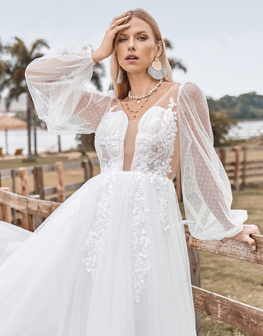 Luolandi Long Sleeves Open Back Ivory A Line Wedding Dress with Appliques Floor Length