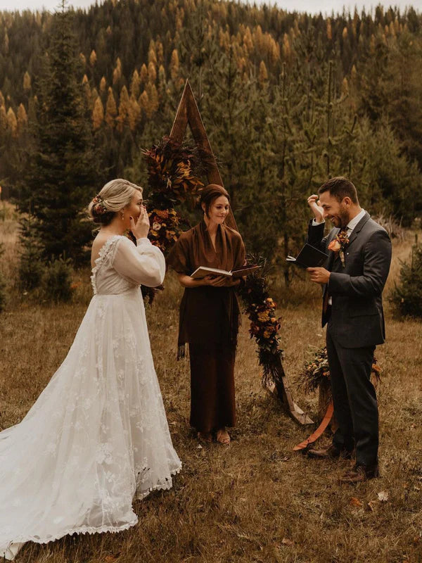 Luolandi Tulle Appliques Illusion Long Sleeves V-Neck Backless Wedding Dresses Elegant