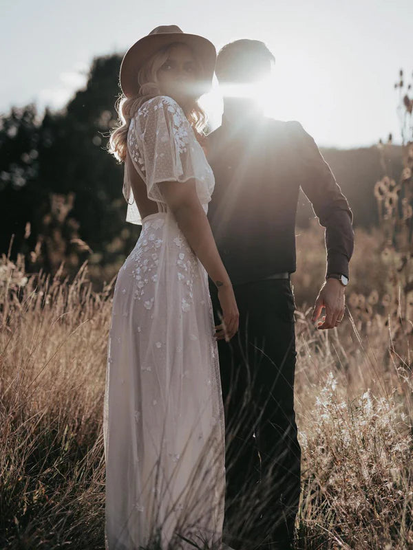 Luolandi Unique Floral Lace Bat Sleeves A-line Floor-length Wedding Dresses Beautiful