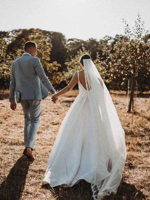 Luolandi Simple A-Line Satin Beaded Bowknot Backless Sleeveless Wedding Dresses With Bow