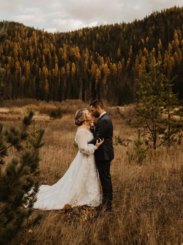 Luolandi Tulle Appliques Illusion Long Sleeves V-Neck Backless Wedding Dresses Elegant