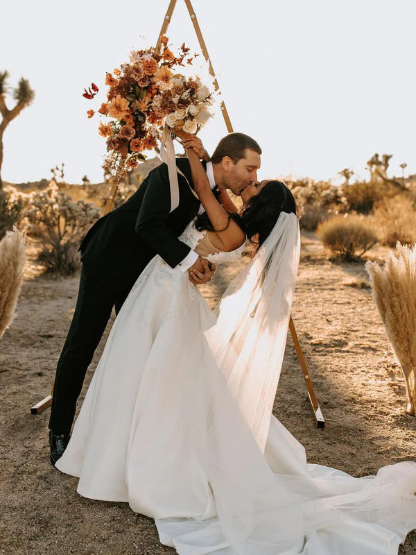 Luolandi Elegant Deep V-neckline Appliqued Satin Chapel Train A-line Wedding Dresses Sexy