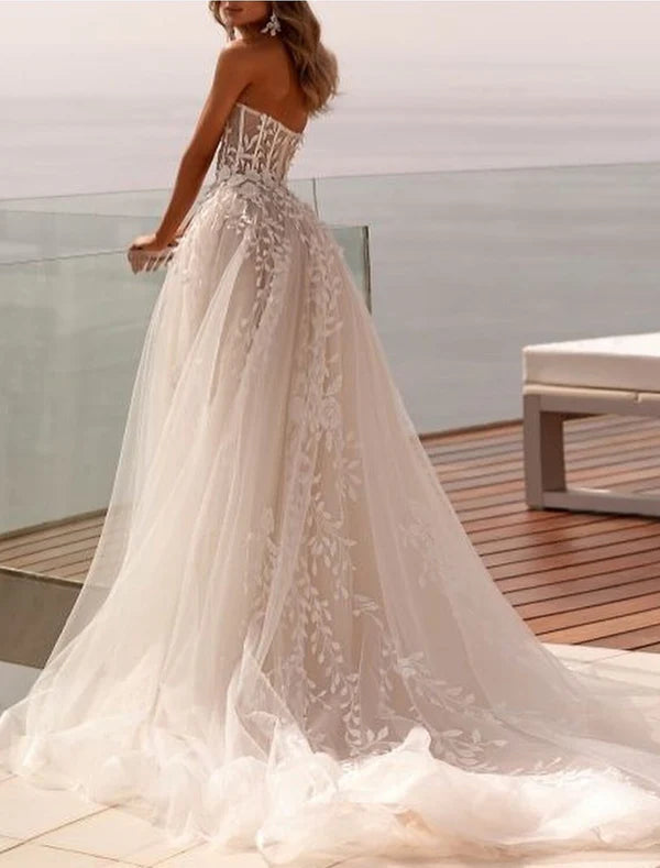 Luolandi Beach Open Back Formal Wedding Dresses Ball Gown Sweetheart Sleeveless Sweep / Brush Train Tulle Bridal Gowns With Appliques