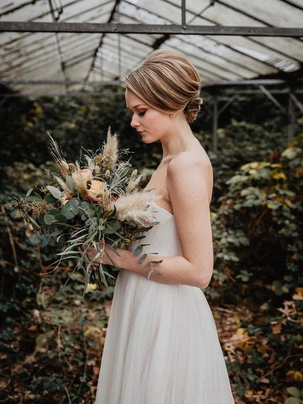 Luolandi Delicate Tulle Off-The-Shoulder Strapless Neckline Beaded A-line Wedding Dresses Charming