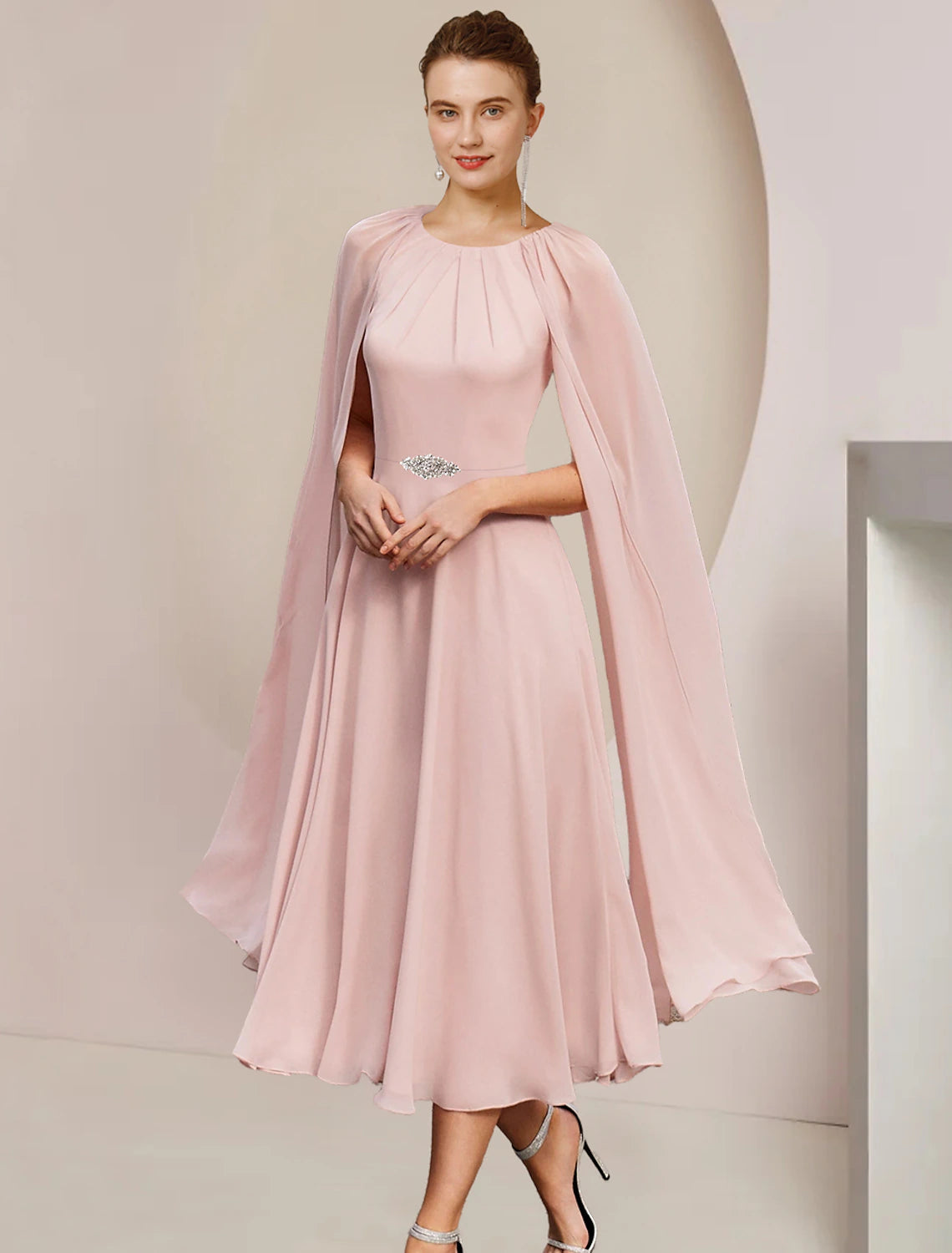 Elegant A-line chiffon tea-length dress with scoop neck and pleats.