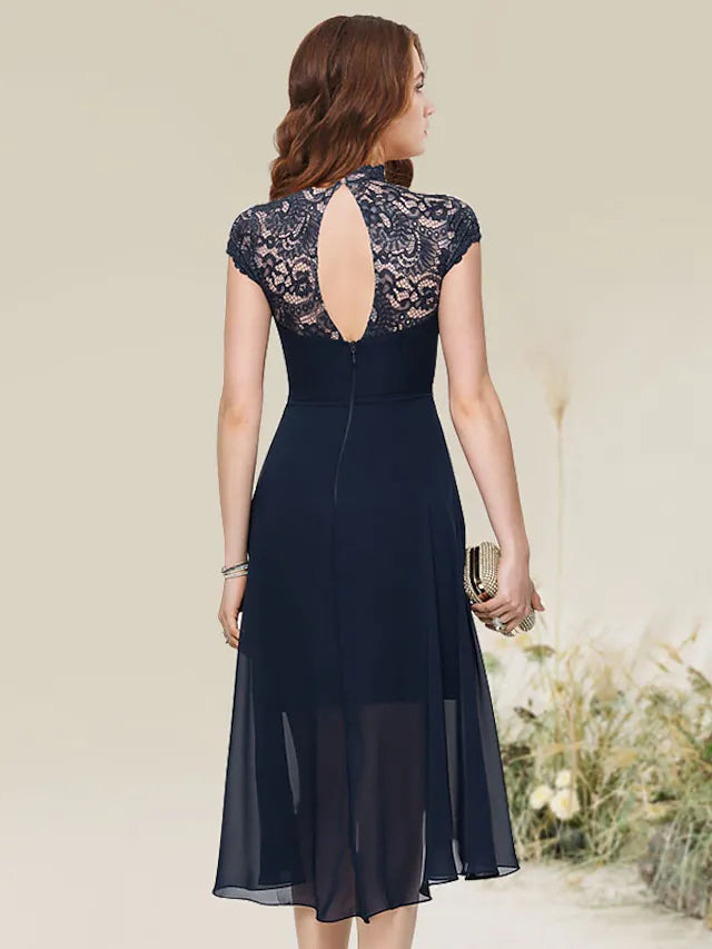 Side view of the A-line cocktail dress, highlighting the asymmetrical hem and lace insert.