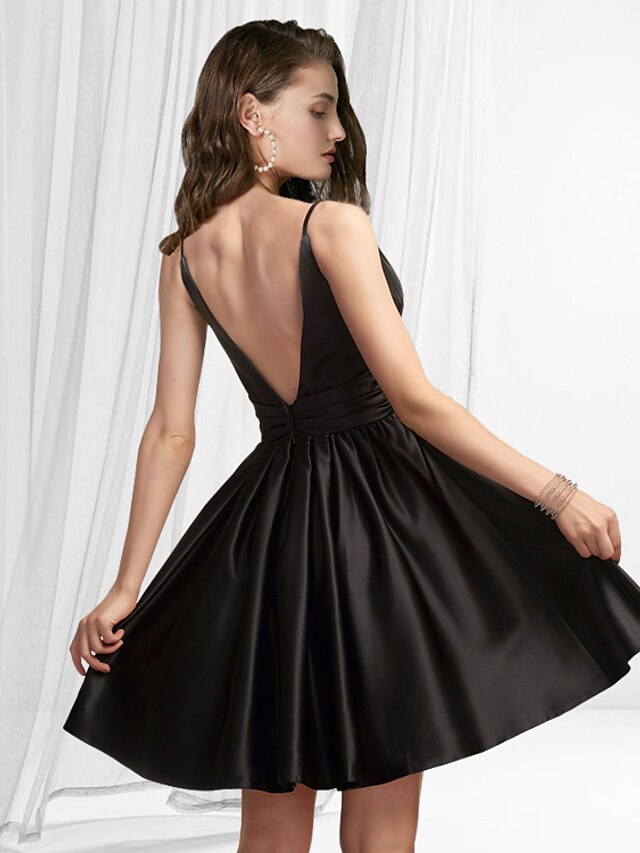 Back view of a light blue A-line satin homecoming dress with V-neck.