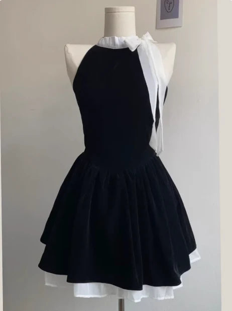 Black A-line halter short dress for homecoming and parties.