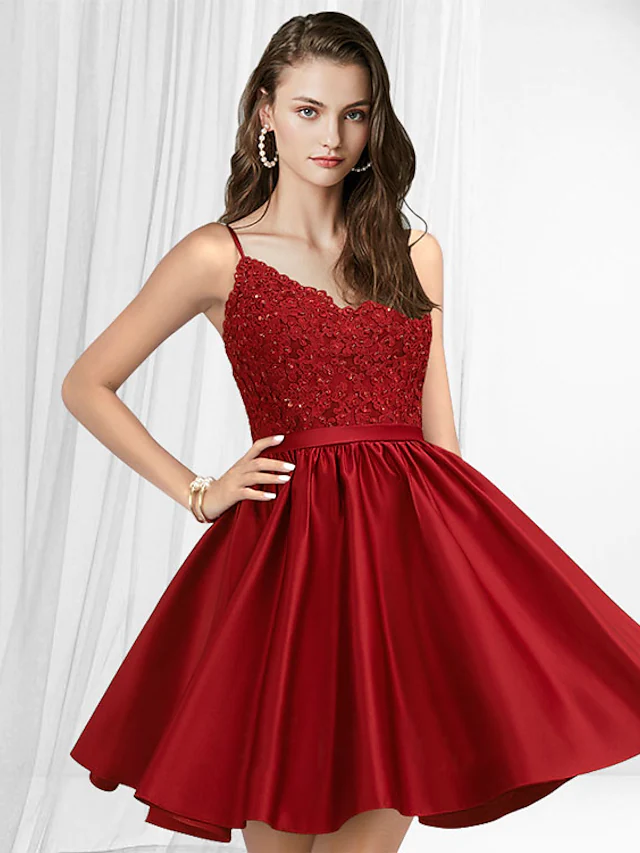 Back view of a woman wearing a Luolandi A-line lace and satin homecoming cocktail dress.