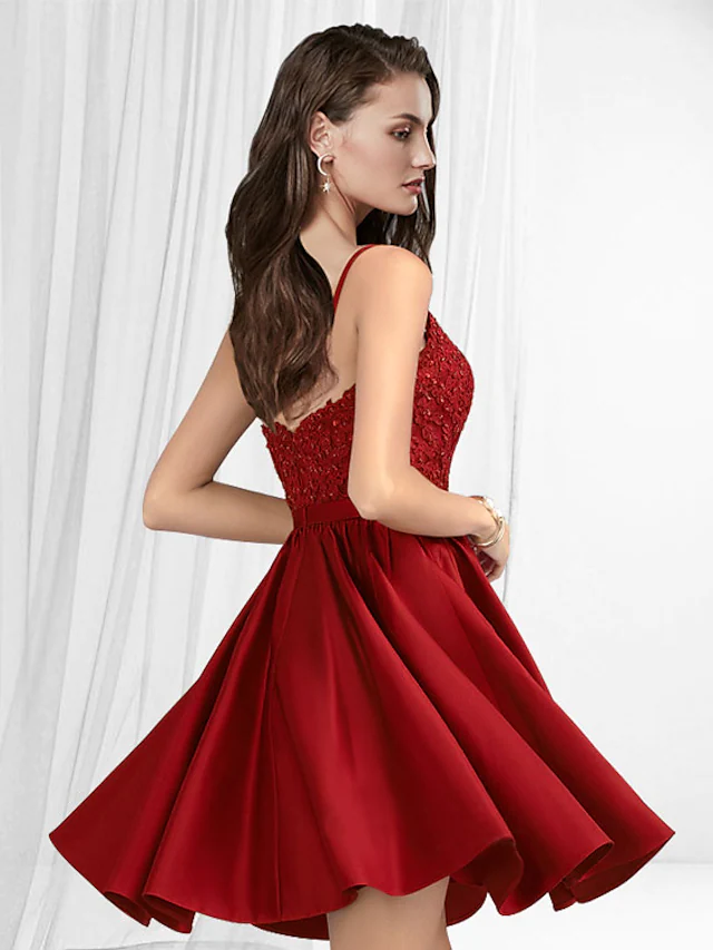 Side view of a woman wearing a Luolandi A-line lace and satin homecoming cocktail dress.