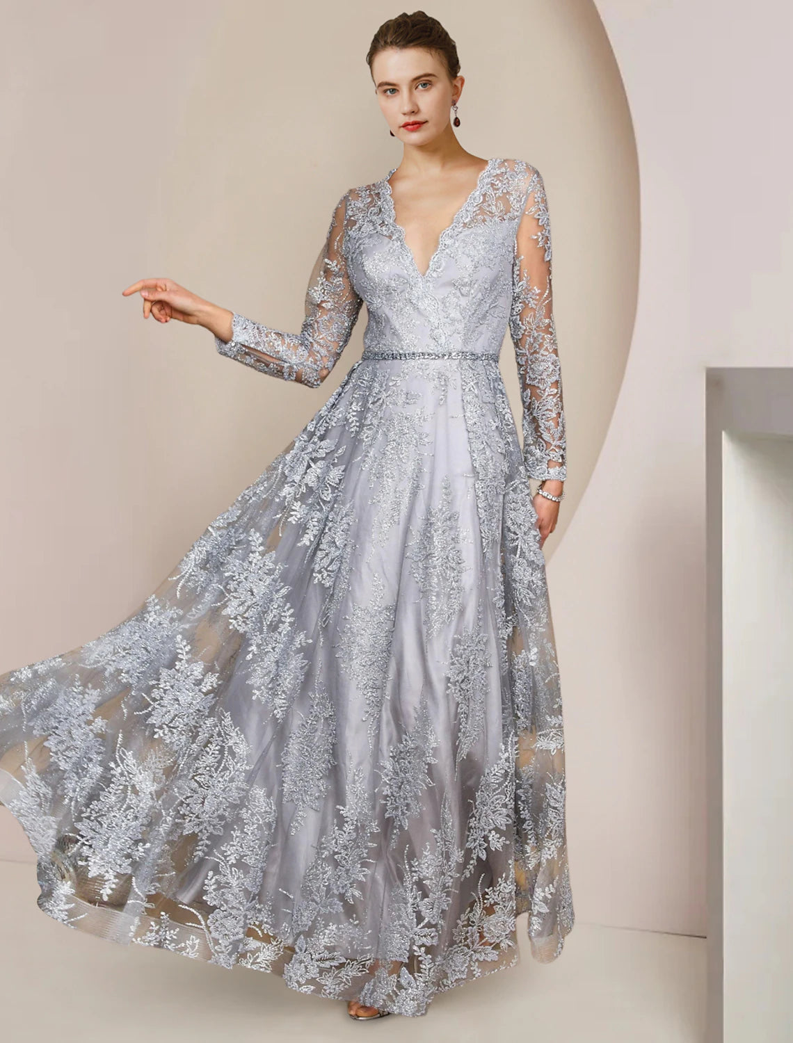 Elegant A-Line Mother of the Bride dress with V-neck, long lace sleeves, appliques, and crystal details.