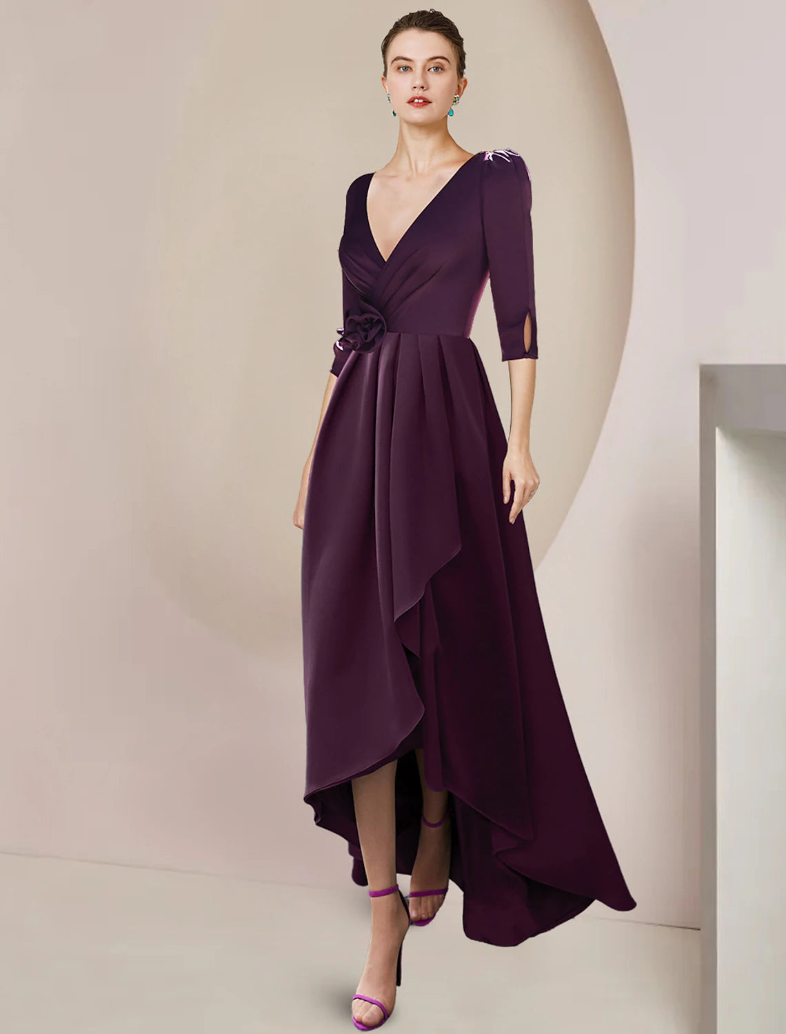 Elegant A-line high-low V-neck chiffon dress with 3/4 sleeves and flower detail.