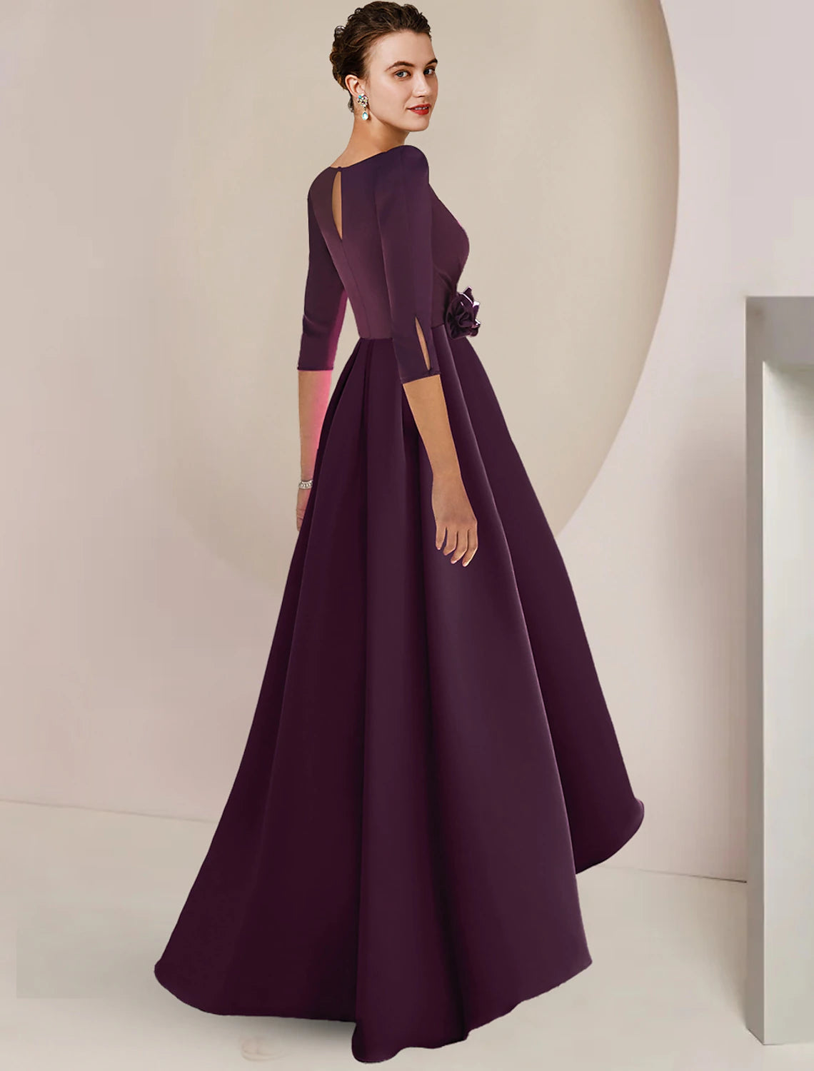Elegant A-line high-low V-neck chiffon dress with 3/4 sleeves and flower detail.