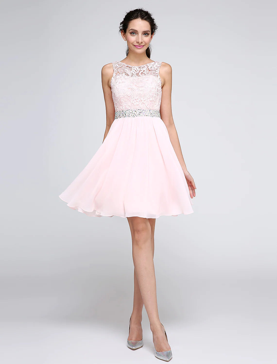 Model wearing a Luolandi A-Line short chiffon dress with illusion neckline, V-back, and crystal embellishments.