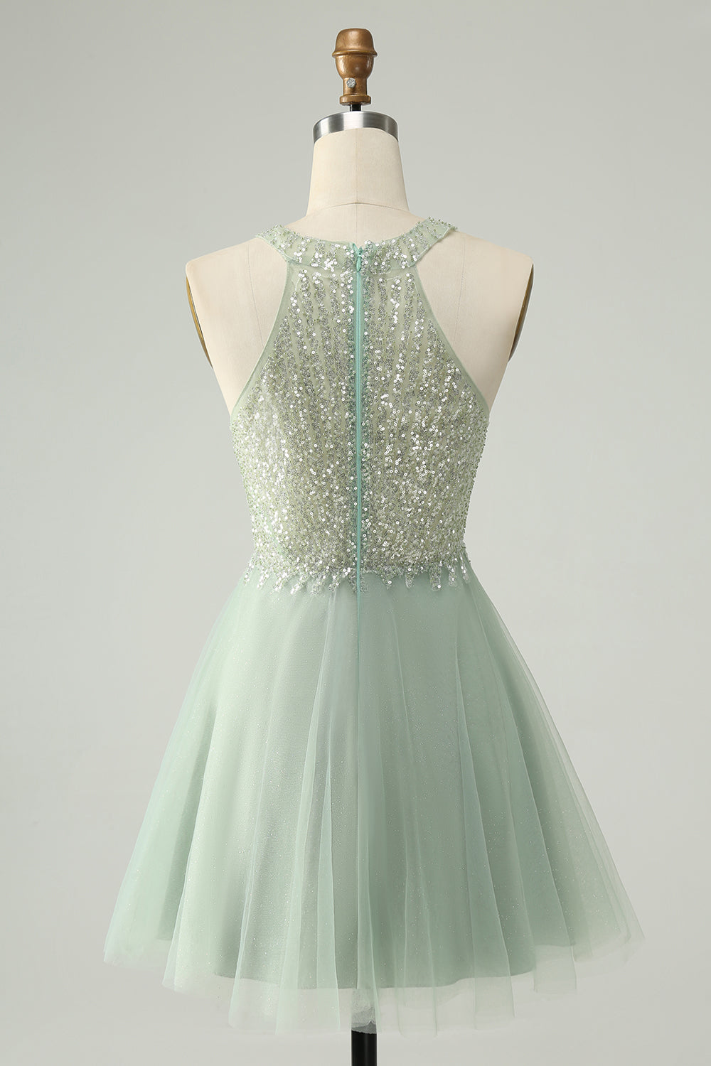 Back view of the dusty green A-line halter short homecoming dress, showcasing the sequin details.