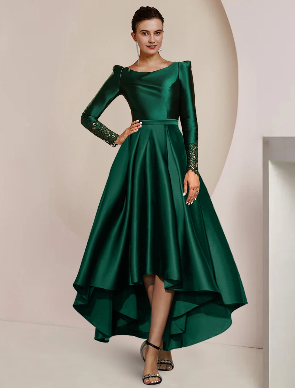 Elegant A-line mother of the bride dress with long sleeves and a high-low tea length hem.