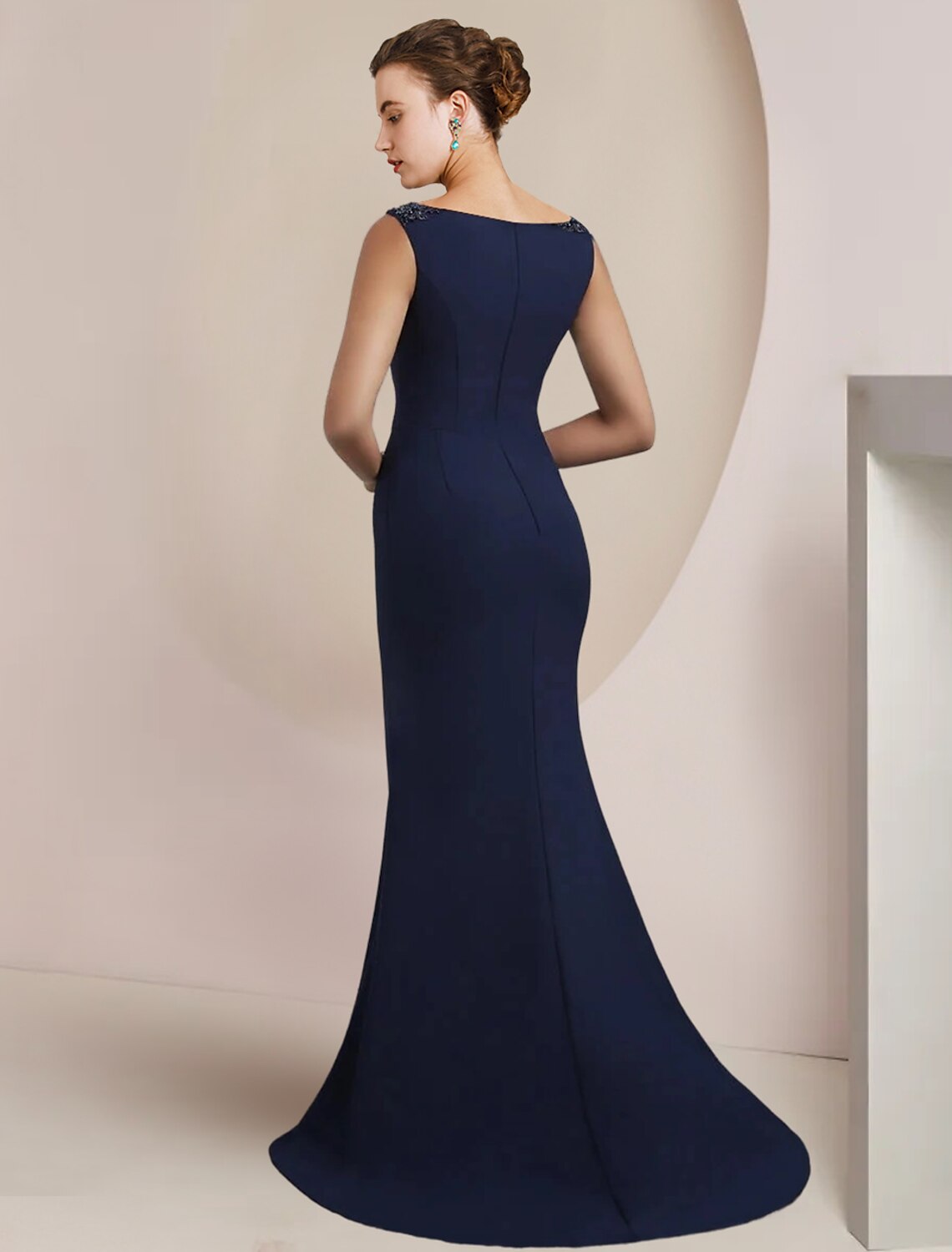 Back view of Luolandi Mermaid formal gown showing sweep train and sleeveless design.