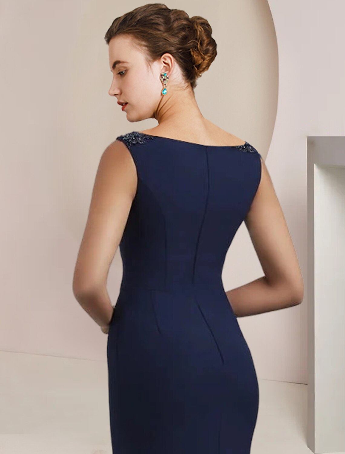 Close-up of the beaded detail on the Luolandi Mother of the Bride dress.