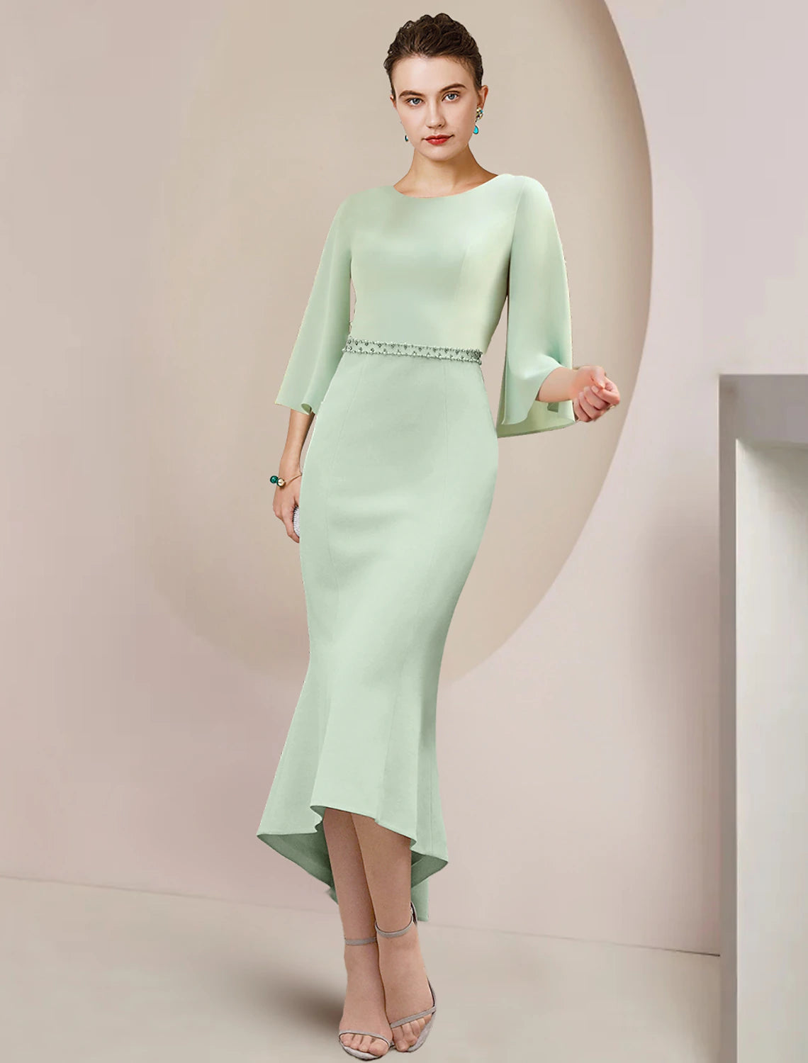 Elegant mermaid trumpet mother of the bride dress with scoop neck and 3/4 sleeves.