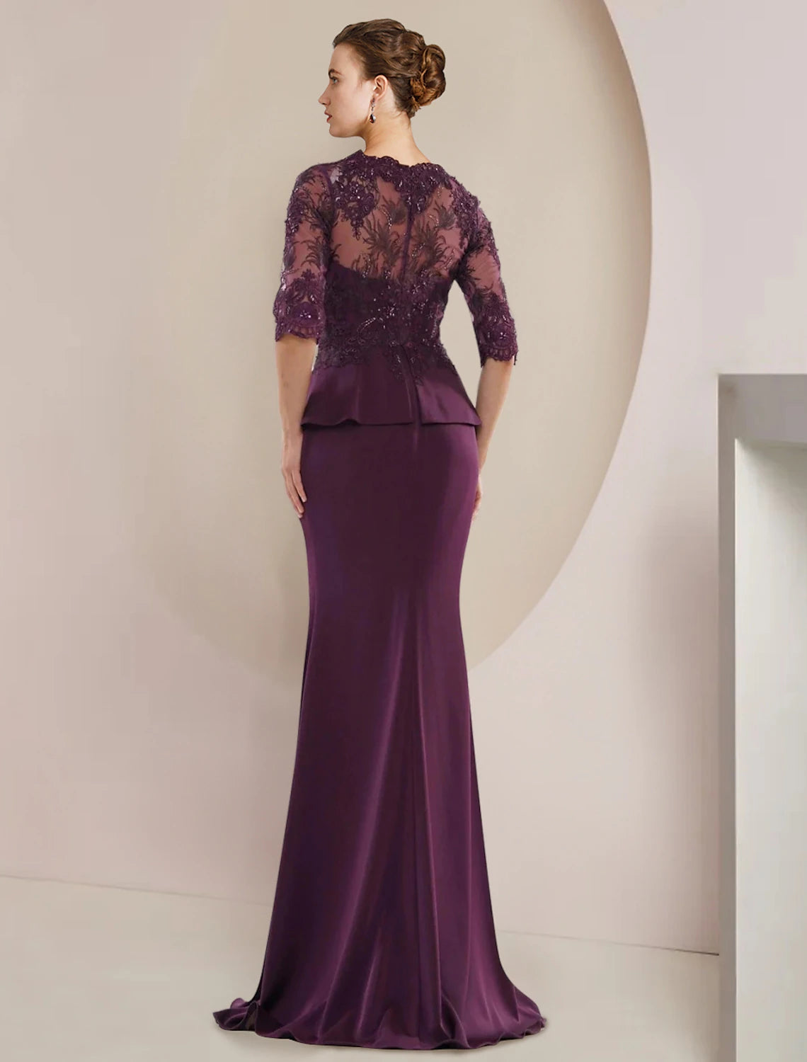 Elegant chiffon Mother of the Bride gown featuring half sleeves and beading.