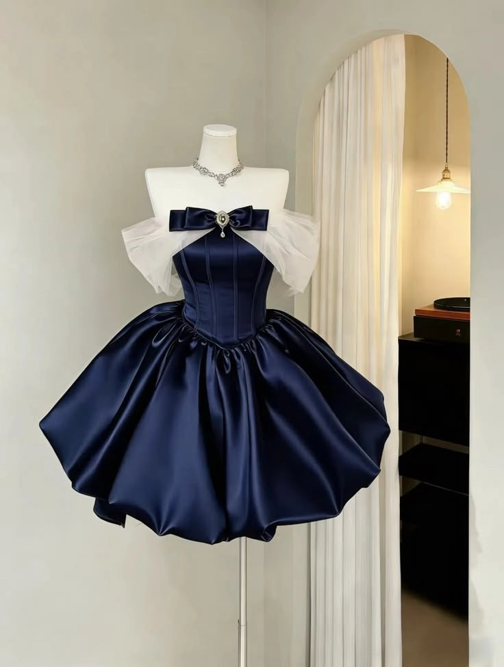 Back view of a blue off-shoulder A-line short dress with a discreet zipper.