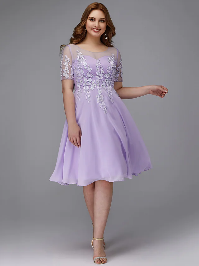 Back view of the A-line plus size homecoming cocktail dress, showing lace details.