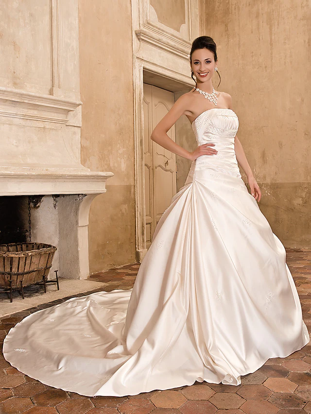 Luolandi Princess A-Line wedding dress, strapless satin gown with chapel train, front view.