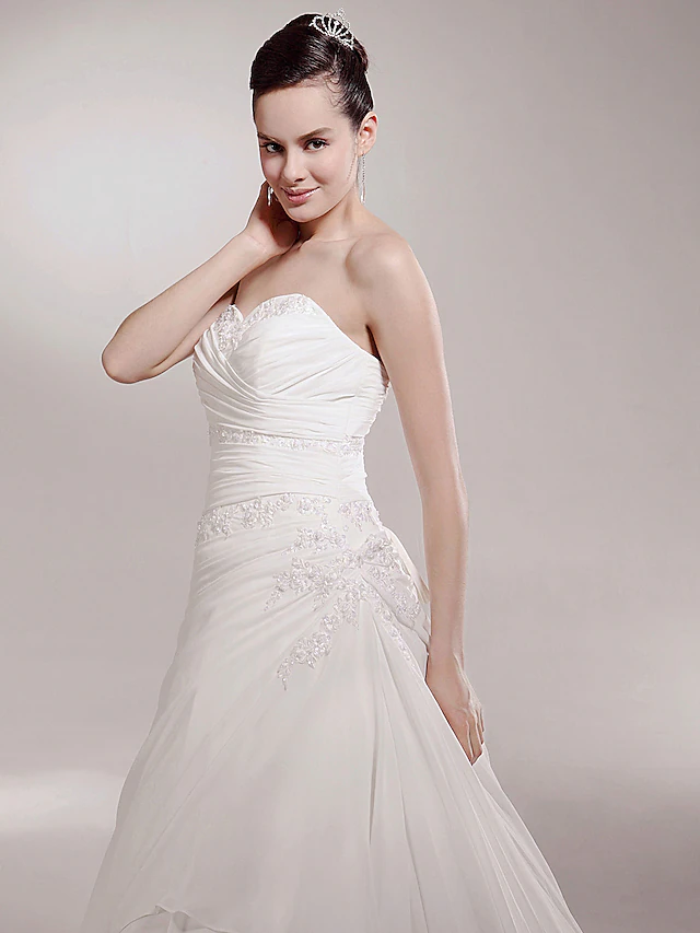 Full view of the elegant A-Line chiffon wedding dress.