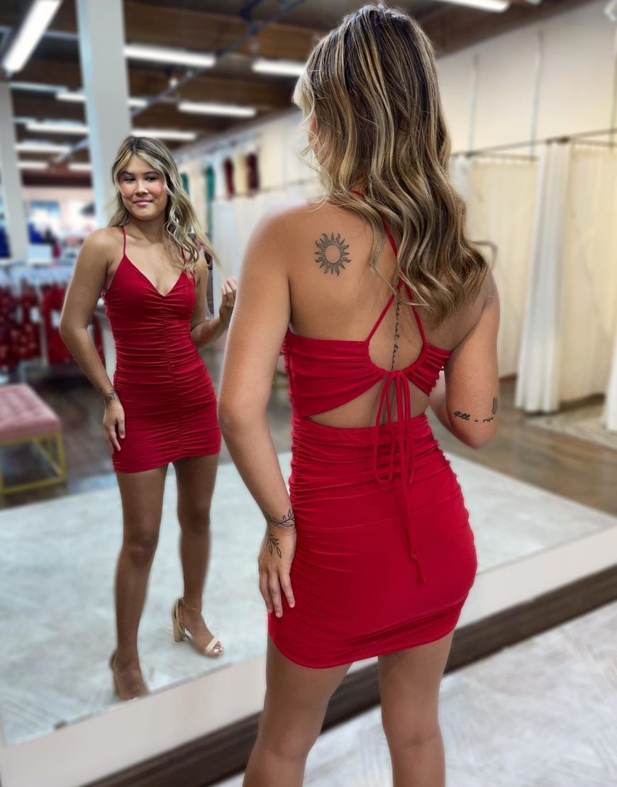 Back view of a Luolandi red spaghetti strap bodycon party dress featuring a keyhole detail.