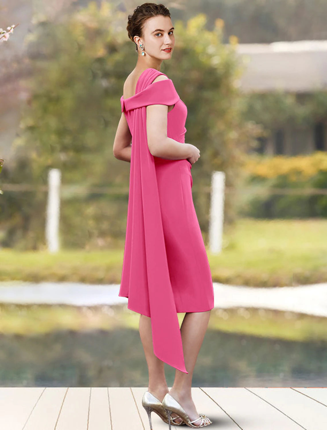 Side view of the knee-length Luolandi Mother of the Bride dress, showcasing side-draped detail.